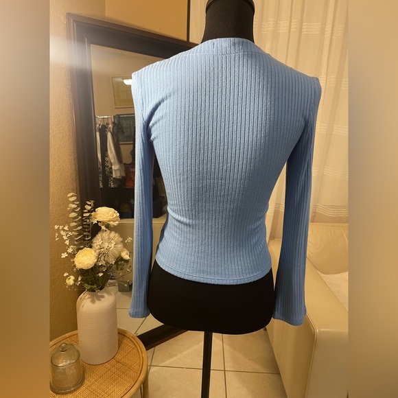 Reformation Gellar Button Front Long
Sleeve Ribbed Knit Top Parisian Blue. - Picture 7 of 15